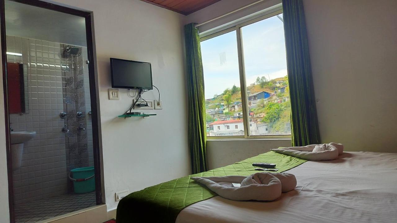 Achus Holidays Munnar Buitenkant foto